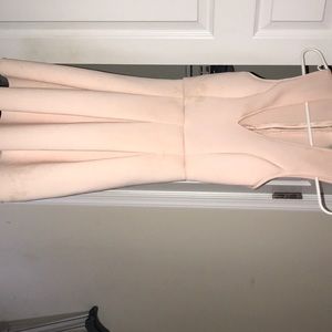 Light pink dress low cut from the chest area